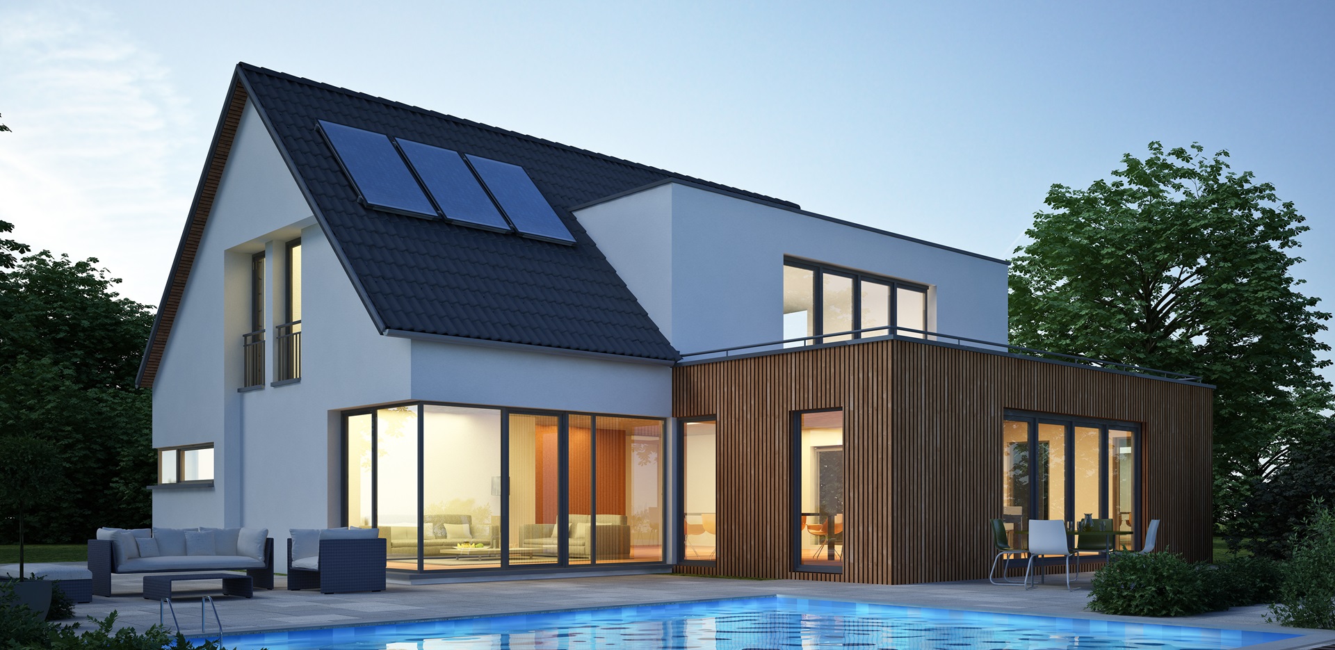 Modernized house with solar panels and pool in the evening